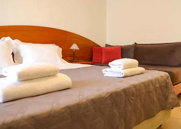 호텔 Corinthian Village 3*